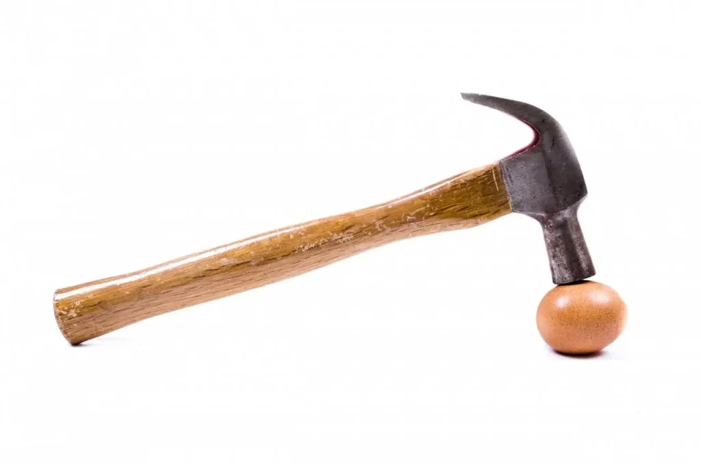 Hammer striking a ball